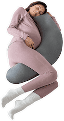 Pregnant woman sleeping on her side hugging the grey 2-in-1 pregnancy pillow