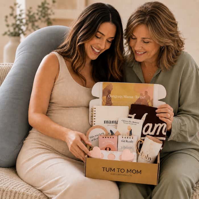 Mum-to-be opening a Tum to Mom box with a friend